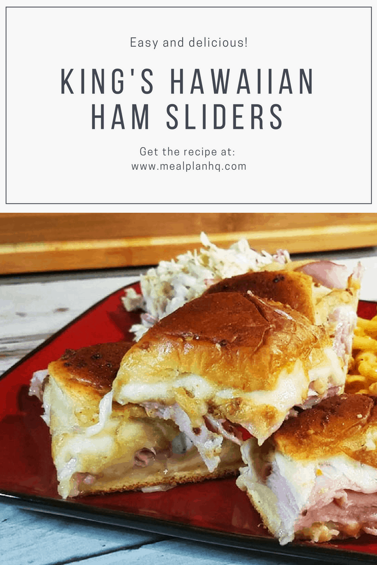 ham sliders stacked on a red plate.