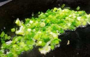 Green onions cooking in butter