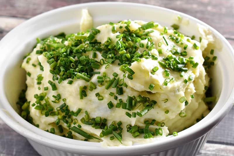 Instant Pot Mashed Potatoes topped with chives