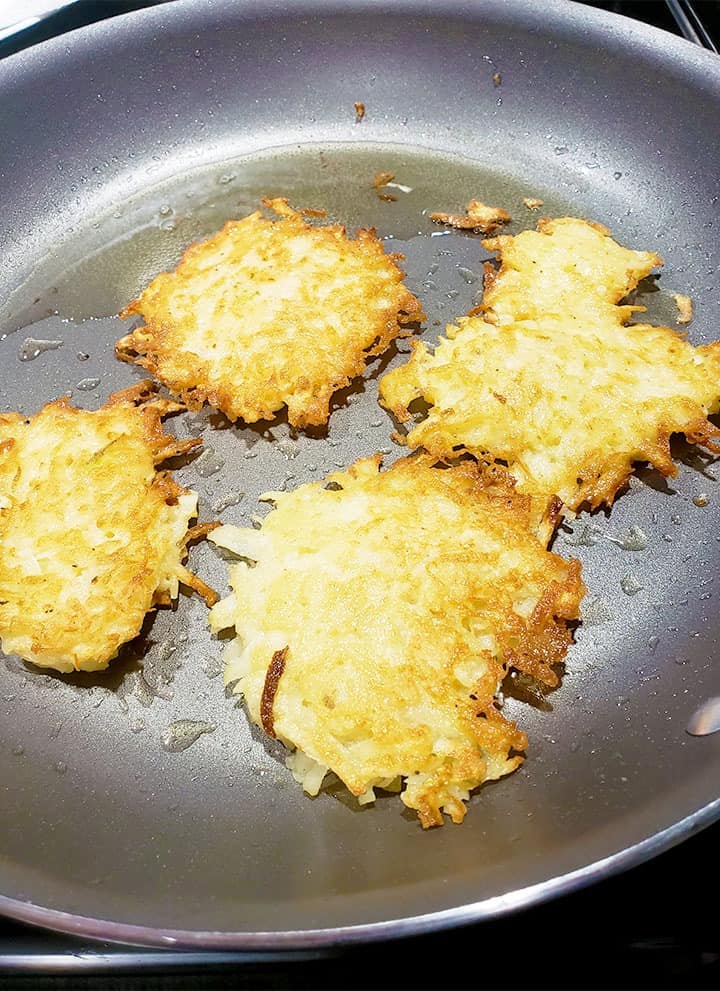 Potato Pancakes Latkes Cooking in a frying pan