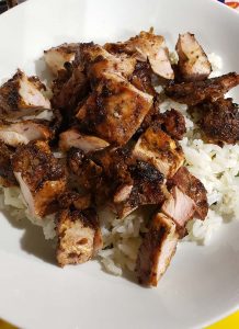 Chopped copycat chipotle chicken sitting on rice