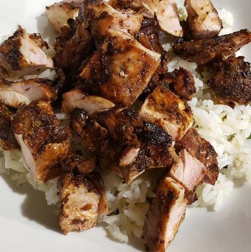 Chopped copycat chipotle chicken sitting on rice