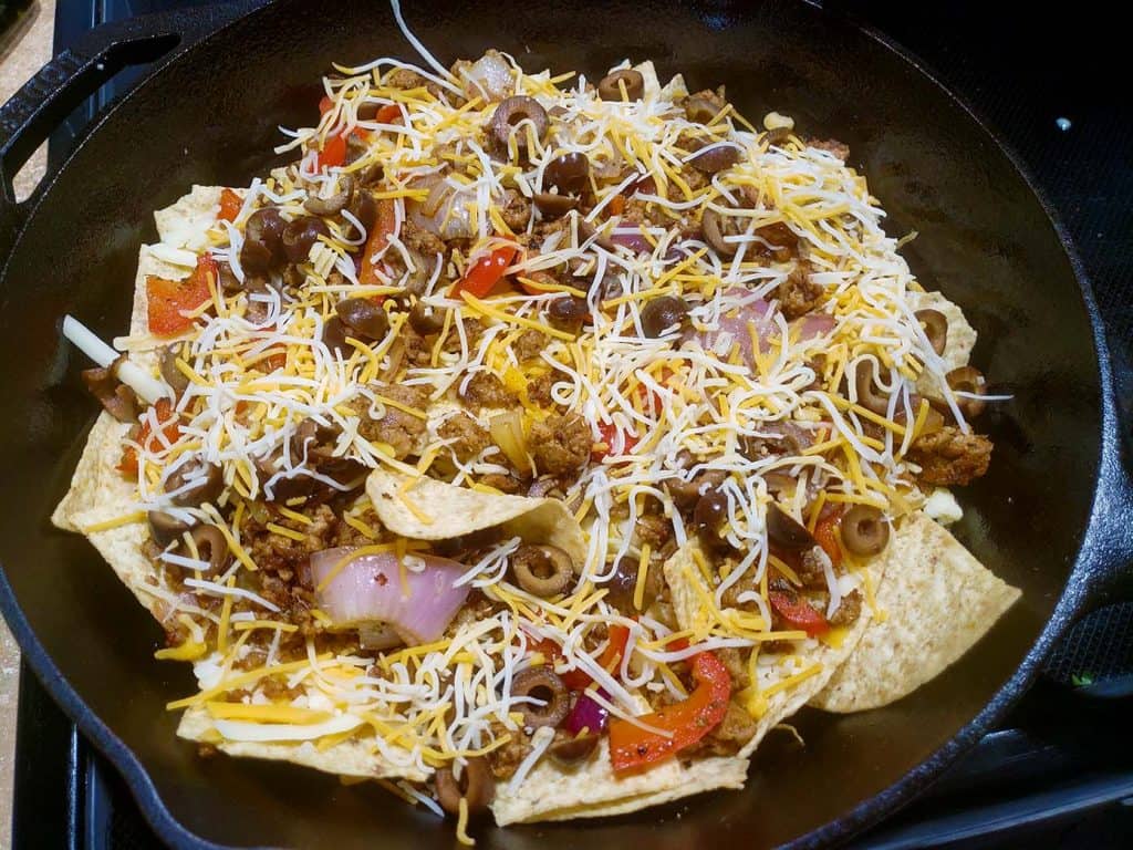 Loaded Nachos in a cast iron pan