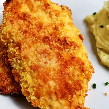 Parmesan Crusted Chicken on a white plate