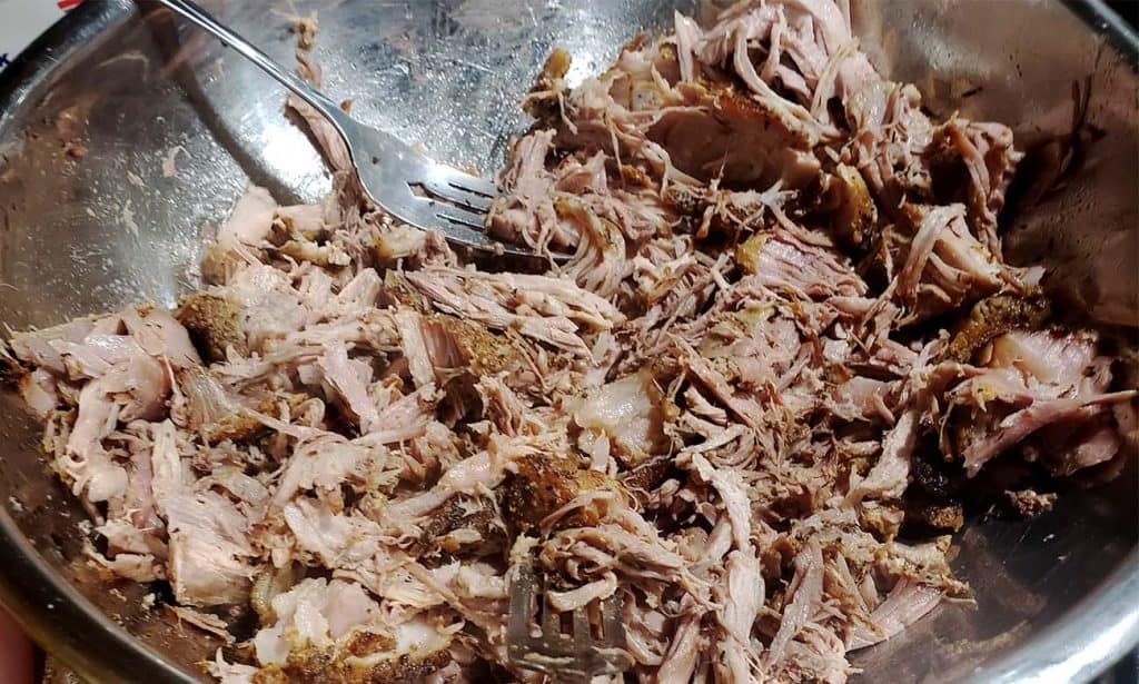 mixing bowl with pulled butt roast