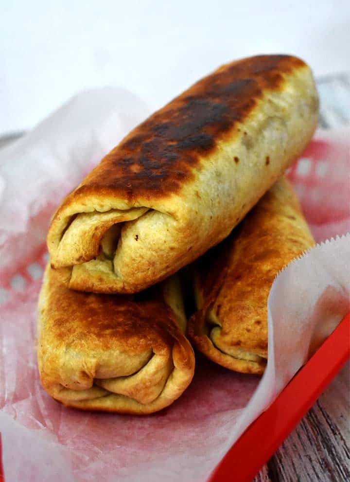 Baked Chimichangas in a red basket