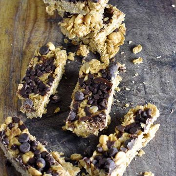 homemade granola bars on a wooden cutting board
