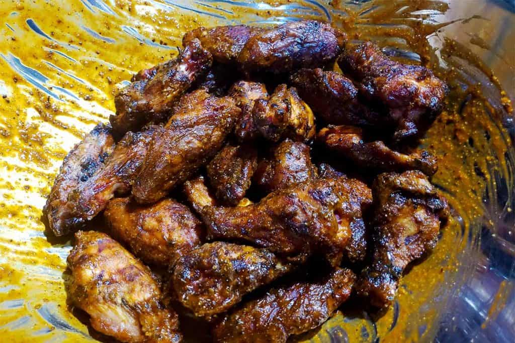 smoked chicken wings tossed with buffalo sauce