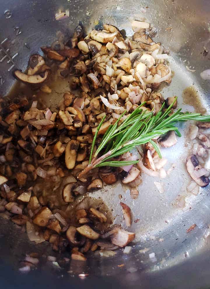 mushrooms and rosemary cooking in an instant pot
