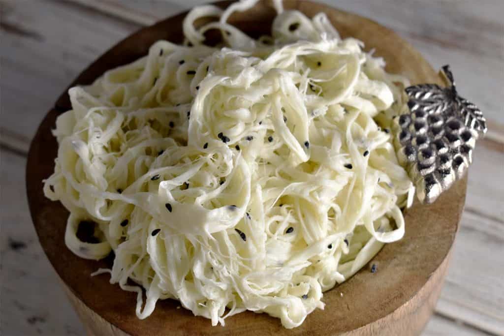 syrian string cheese in bowl with grape decoration