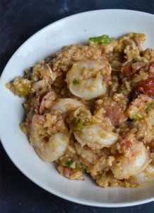 Instant Pot Jambalaya in a white bowl on a black table