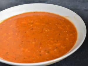 instant pot red pepper soup in a white bowl