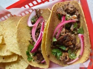 instant pot barbacoa tacos with pickled red onions and cilantro