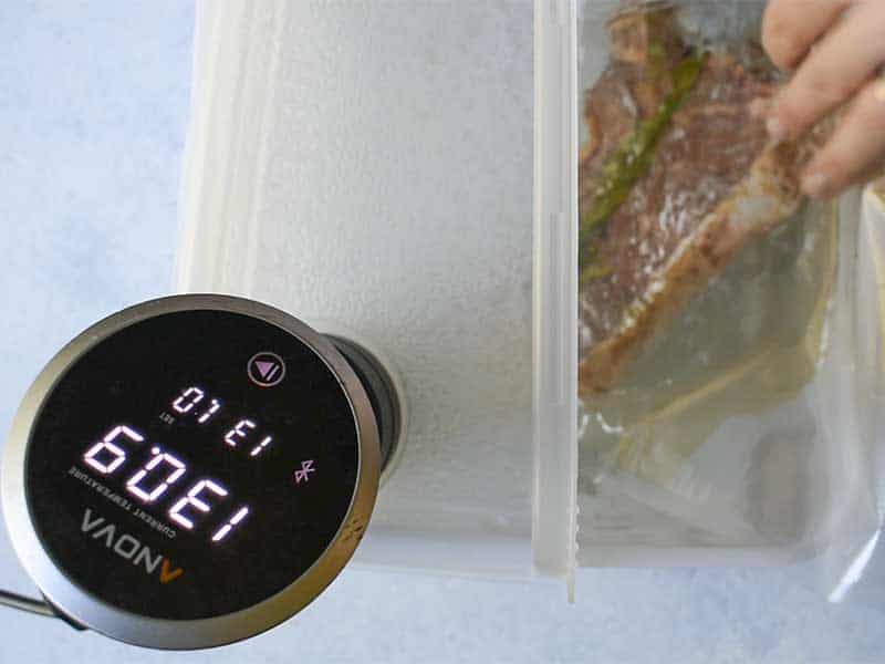 Steak put in sous vide water circulator