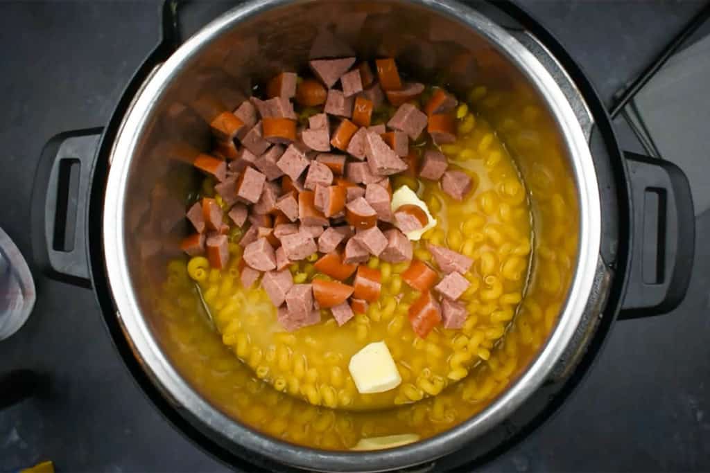 macaroni and kielbasa uncooked in an instant pot